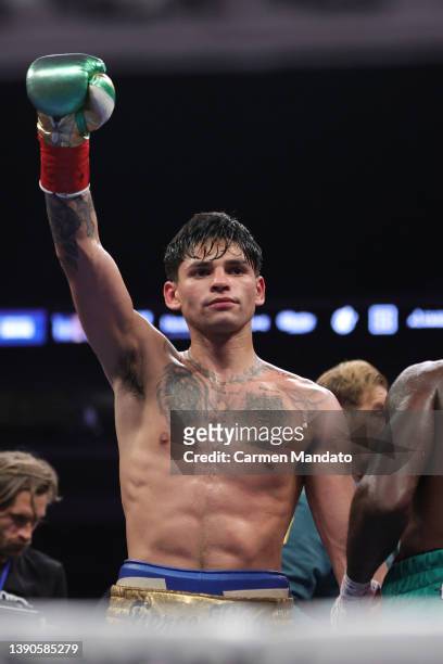 Ryan Garcia celebrates defeating Emmanuel Tagoe in their Lightweight bout at the Alamodome on April 09, 2022 in San Antonio, Texas.