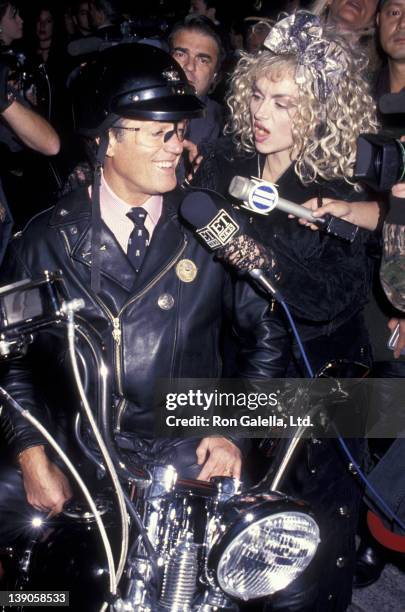Peter Fonda and Judy Tenuta attend the grand opening of the Harley-Davidson Cafe on October 19, 1993 in New York City.