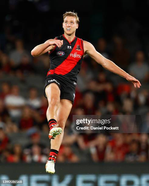 Darcy Parish of the Bombers kicks the ball during the round four AFL match between the Essendon Bombers and the Adelaide Crows at Marvel Stadium on...