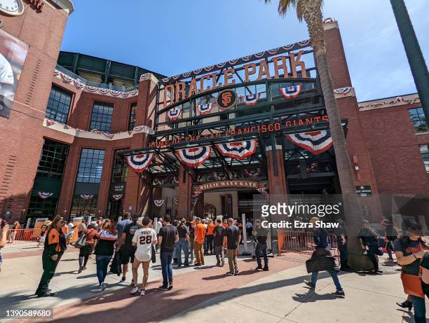 Fans enter the stadium for the San Francisco Giants opening day game against the Miami Marlins at Oracle Park on April 08, 2022 in San Francisco,...