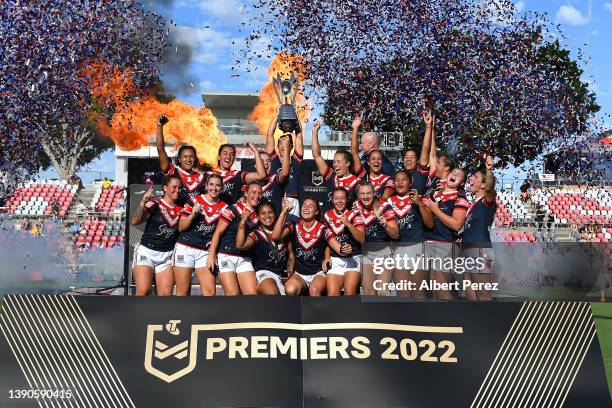 Roosters celebrate with the trophy after their victory during the NRLW Grand Final match between the St George Illawarra Dragons and the Sydney...