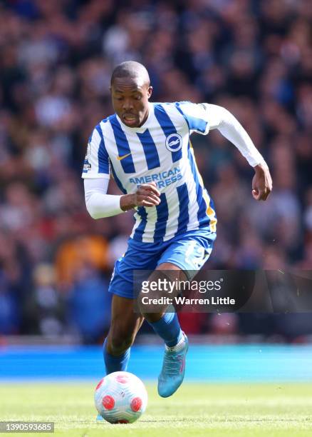 Enock Mwepu of Brighton & Hove Albion runs withe ball during the Premier League match between Arsenal and Brighton & Hove Albion at Emirates Stadium...