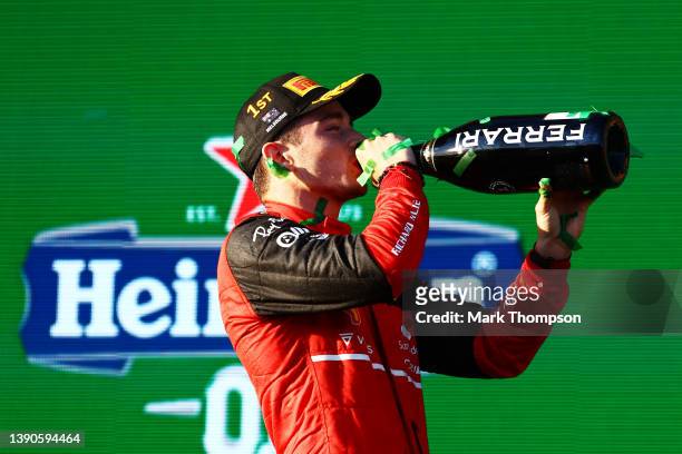 Race winner Charles Leclerc of Monaco and Ferrari celebrates on the podium during the F1 Grand Prix of Australia at Melbourne Grand Prix Circuit on...