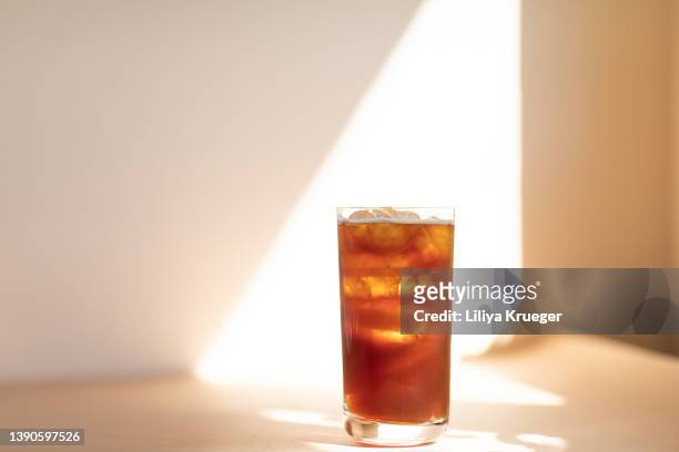 iced coffe. - ice cubes background stock pictures, royalty-free photos & images