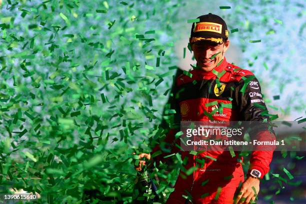 Race winner Charles Leclerc of Monaco and Ferrari celebrates on the podium after the F1 Grand Prix of Australia at Melbourne Grand Prix Circuit on...
