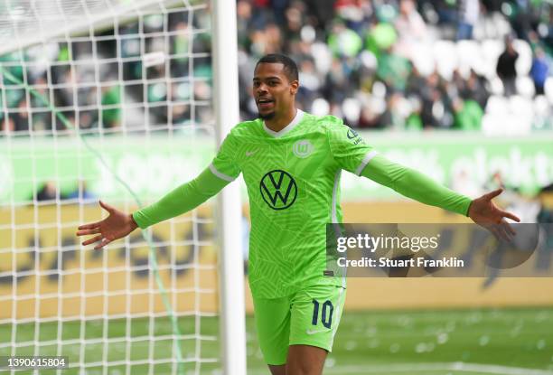 Lukas Nmecha of Wolfsburg celebrates after scoring his goal during the Bundesliga match between VfL Wolfsburg and DSC Arminia Bielefeld at Volkswagen...