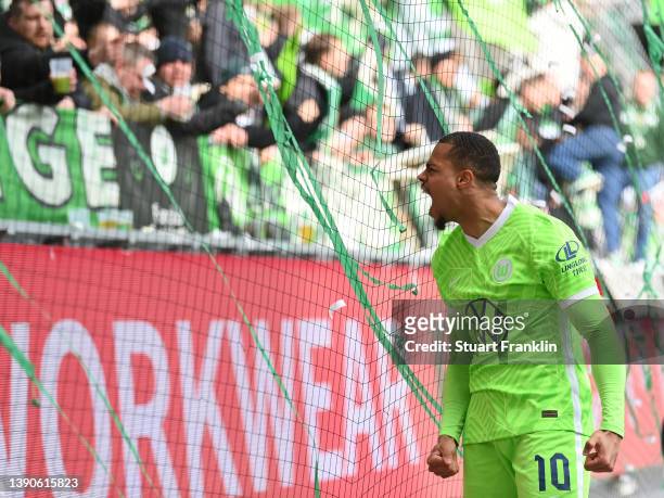 Lukas Nmecha of Wolfsburg celebrates after scoring his goal during the Bundesliga match between VfL Wolfsburg and DSC Arminia Bielefeld at Volkswagen...