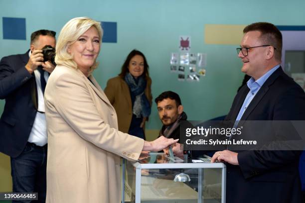 Far-right leader and candidate for presidential election Marine Le Pen casts her ballot in first round of elections on April 10, 2022 in...