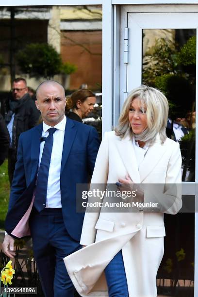 French First Lady Brigitte Macron salutes the crowd as she arrives to the poll station on April 10, 2022 in Le Touquet-Paris-Plage, France. Nearly 50...