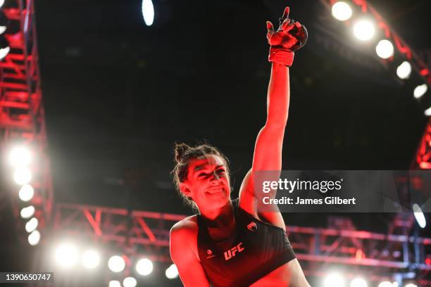 Mackenzie Dern reacts after her victory over Tecia Torres in their strawweight fight during the UFC 273 event at VyStar Veterans Memorial Arena on...