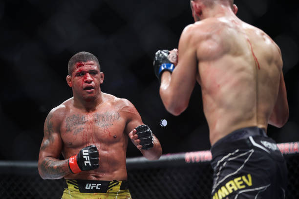 Gilbert Burns of Brazil battles Khamzat Chimaev of Russia in their welterweight fight during the UFC 273 event at VyStar Veterans Memorial Arena on...