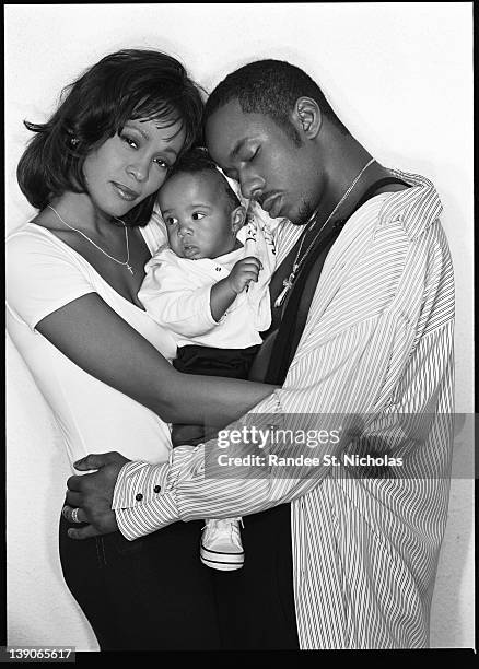 Singer/ songwriter Whitney Houston and singer Bobby Brown, are photographed with their baby daughter Bobbi Kristina Houston.