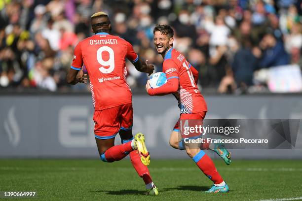 Dries Mertens of SSC Napoli celebrates with team mate Victor Osimhen after scoring their sides first goal during the Serie A match between SSC Napoli...