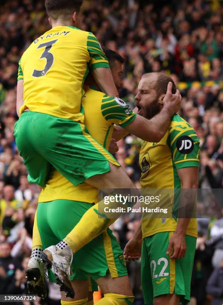 Teemu Pukki of Norwich City celebrates with team mates after scoring their sides second goal during the Premier League match between Norwich City and...