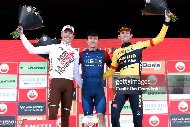 Benoit Cosnefroy of France and AG2R Citröen Team on second place, race winner Michal Kwiatkowski of Poland and Team INEOS Grenadiers and Tiesj Benoot...