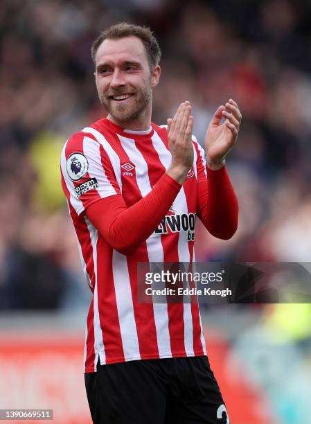 Christian Eriksen of Brentford applauds fans following their sides victory after the Premier League match between Brentford and West Ham United at...