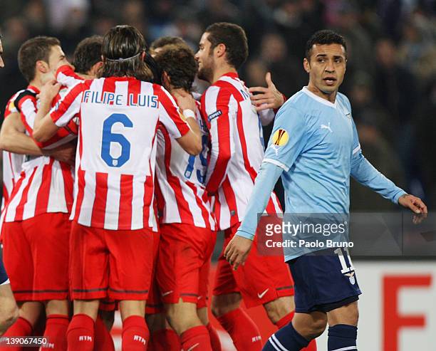 Players of Club Atletico de Madrid celebrate the second goal scored by Falcao as Francelino Matuzalem of SS Lazio reacts during the UEFA Europa...