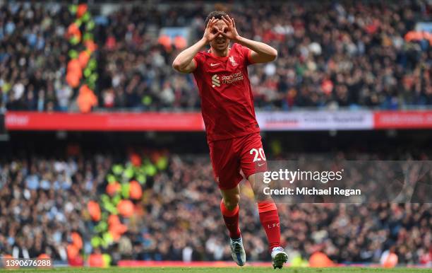 Diogo Jota of Liverpool celebrates after scoring their side's first goal during the Premier League match between Manchester City and Liverpool at...