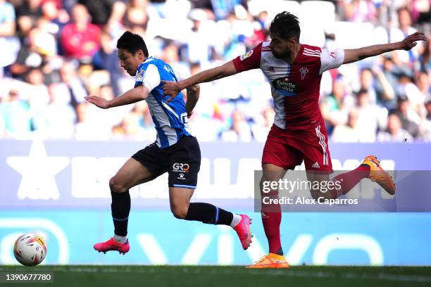 Wu Lei of Espanyol challenged by Néstor Araujo of Celta Vigo during the La Liga Santander match between RCD Espanyol and RC Celta de Vigo at RCDE...