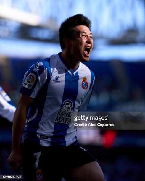 Wu Lei of RCD Espanyol celebrates with his teammate Sergi Darder after scoring his team's first goal during the La Liga Santander match between RCD...