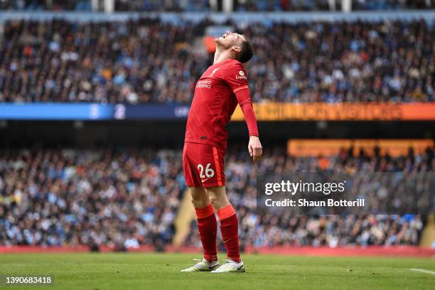 Andrew Robertson of Liverpool celebrates after Sadio Mane scores their sides second goal during the Premier League match between Manchester City and...