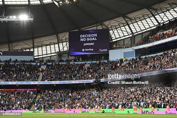 General view inside the stadium as the LED Screen displays a VAR check has concluded that the goal scored by Raheem Sterling of Manchester City won't...
