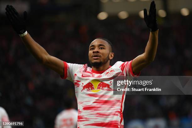 Christopher Nkunku of RB Leipzig celebrates after scoring their side's first goal during the Bundesliga match between RB Leipzig and TSG Hoffenheim...