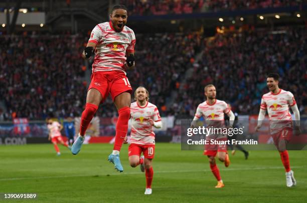 Christopher Nkunku of RB Leipzig celebrates after scoring their side's first goal during the Bundesliga match between RB Leipzig and TSG Hoffenheim...