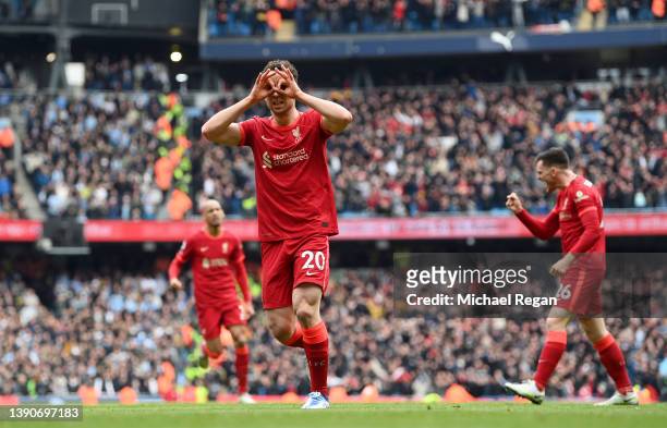 Diogo Jota of Liverpool celebrates after scoring their side's first goal during the Premier League match between Manchester City and Liverpool at...