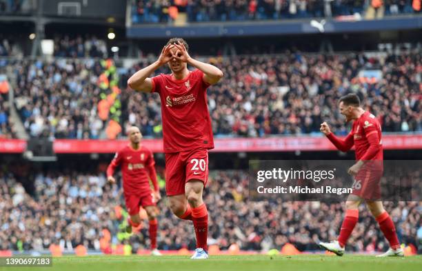 Diogo Jota of Liverpool celebrates after scoring their side's first goal during the Premier League match between Manchester City and Liverpool at...