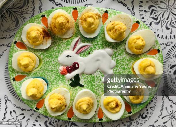 deviled eggs at easter celebration - hard boiled eggs stock-fotos und bilder
