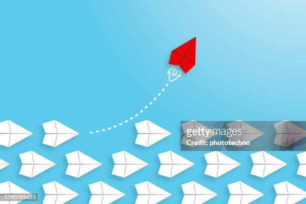 change concepts with red paper airplane leading among white - development stock illustrations