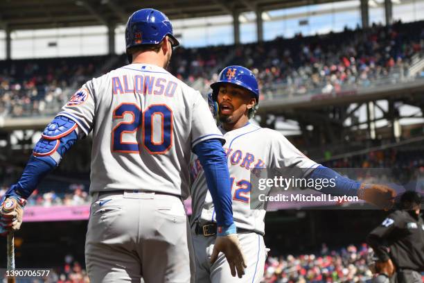 Francisco Lindor of the New York Mets celebrates a solo home run with Pete Alonso in the forth inning a baseball game against the Washington...