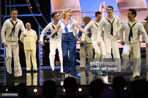 Kerry Ellis performs on stage with the cast of "Everything Goes" during The Olivier Awards 2022 with MasterCard at the Royal Albert Hall on April 10,...