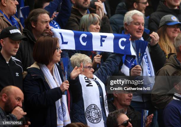 Leicester City fan holds up a scarf during the Premier League match between Leicester City and Crystal Palace at The King Power Stadium on April 10,...