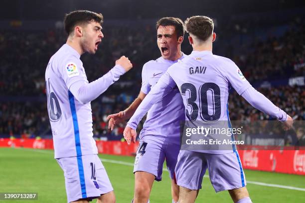 Pedro 'Pedri' Gonzalez of FC Barcelona celebrates after scoring their second side goal with his team mates Eric Garcia and Pablo Martin Paez Gaviria...