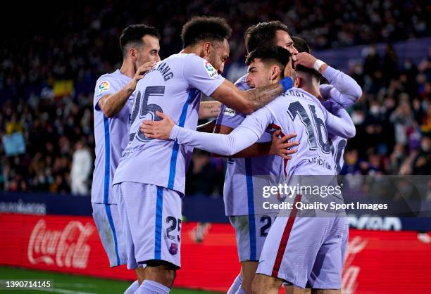 Pedro Gonzalez Lopez 'Pedri' of FC Barcelona celebrates after scoring their side's second goal with his teammates during the La Liga Santander match...