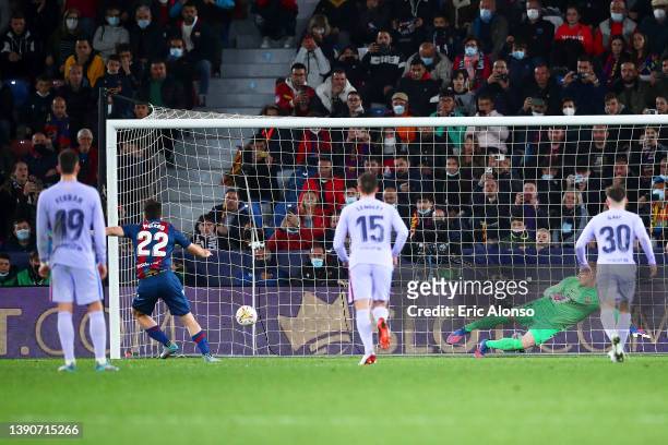 Marc-Andre ter Stegen of FC Barcelona fails to save a penalty from Gonzalo Melero of Levante as they score their side's second goal during the La...