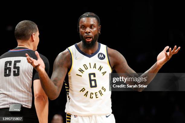 Lance Stephenson of the Indiana Pacers reacts toward referee Nate Green during the first half against the Brooklyn Nets at Barclays Center on April...