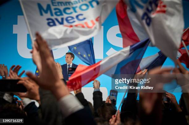President Emmanuel Macron addresses supporters in Paris after polls close in first round of voting in the French Presidential Election with initial...