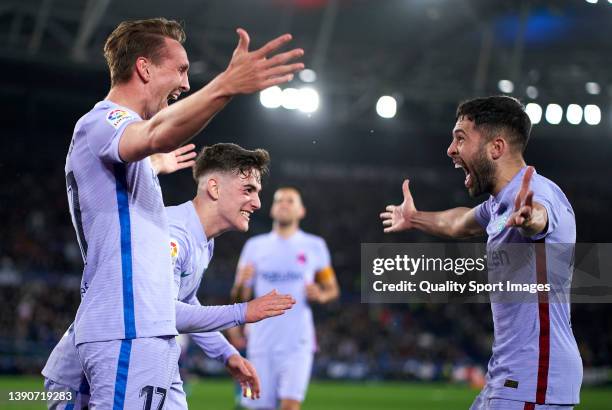 Luuk de Jong of FC Barcelona celebrates after scoring their side's third goal with his teammates Pablo Gavi and Jordi Alba during the La Liga...