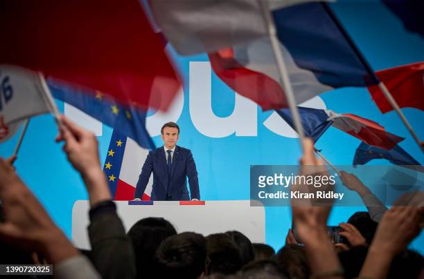 President Emmanuel Macron addresses supporters in Paris after polls close in first round of voting in the French Presidential Election with initial...