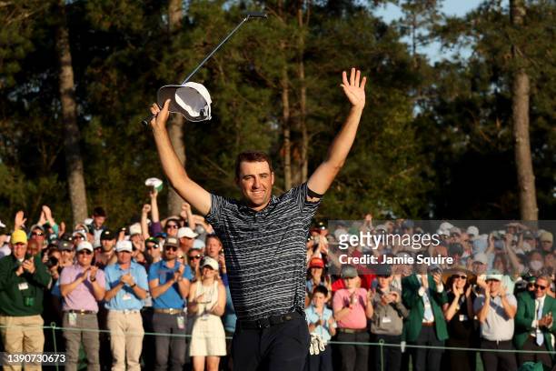 Scottie Scheffler of the United States celebrates on the 18th green after winning during the final round of the Masters at Augusta National Golf Club...