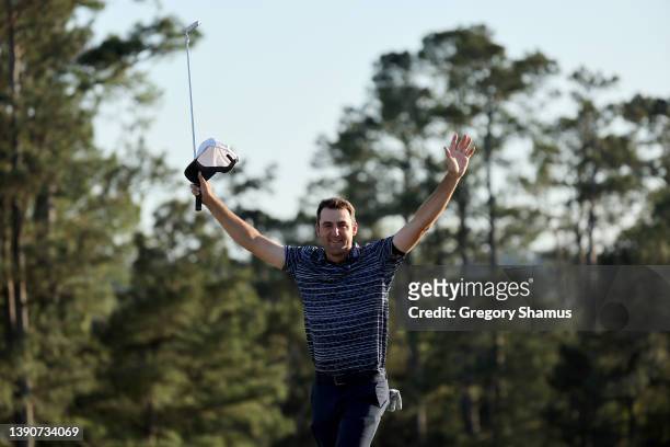 Scottie Scheffler celebrates on the 18th green after winning the Masters at Augusta National Golf Club on April 10, 2022 in Augusta, Georgia.