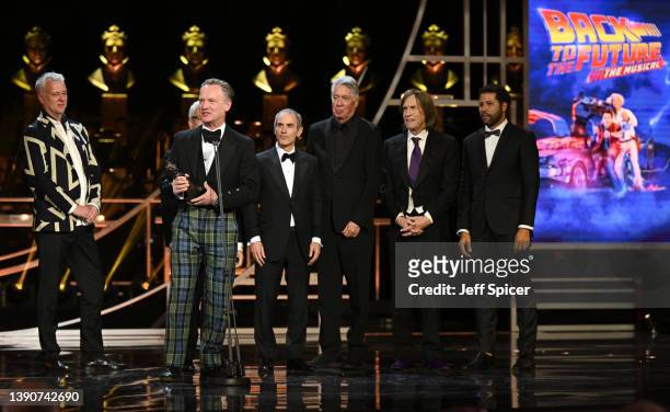 Colin Ingram, guest, Alan Silvestri and Glen Ballard from "Back to the Future" accept the award for Best New Musical on stage during The Olivier...