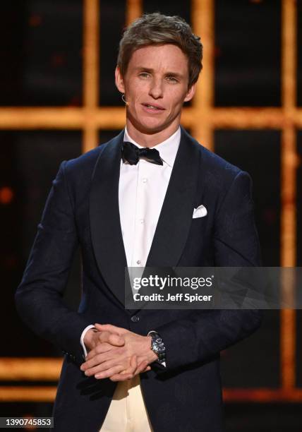 Eddie Redmayne on stage to introduce a performance from the cast of "Cabaret" during The Olivier Awards 2022 with MasterCard at the Royal Albert Hall...