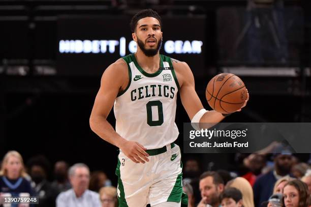 Jayson Tatum of the Boston Celtics brings the ball up court during the second half against the Memphis Grizzlies at FedExForum on April 10, 2022 in...