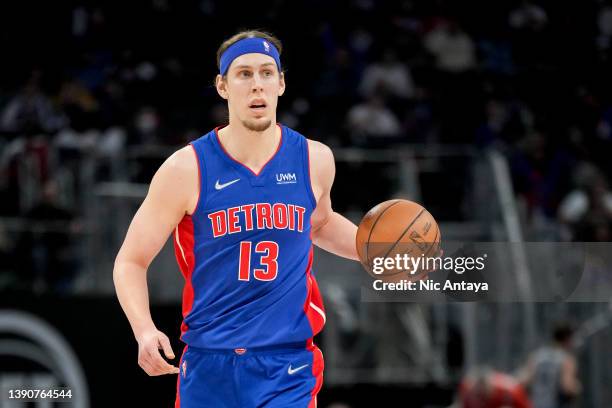 Kelly Olynyk of the Detroit Pistons handles the ball against the Milwaukee Bucks during the second quarter at Little Caesars Arena on April 08, 2022...