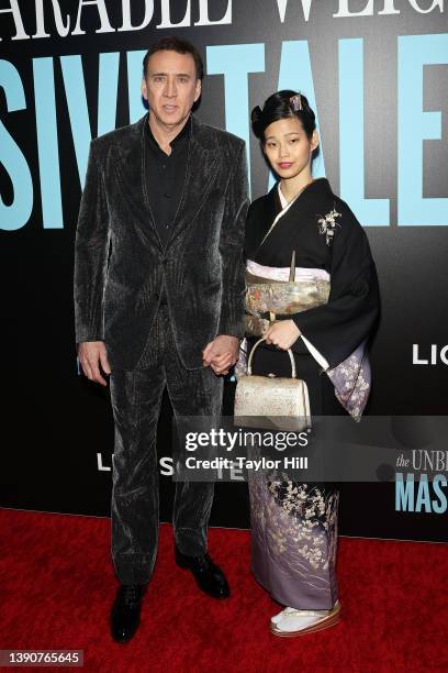 Nicolas Cage and Riko Shibata attend the New York premiere of "The Unbearable Weight of Massive Talent" at Regal Essex Crossing on April 10, 2022 in...