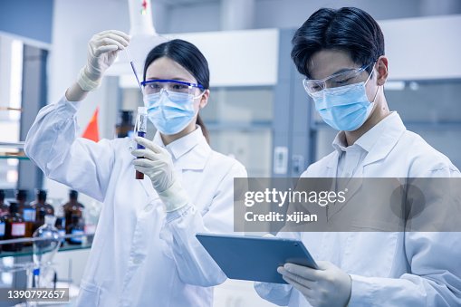 Asian Researchers Asian Scientists Working At The Laboratory High-Res Stock Photo - Getty ...